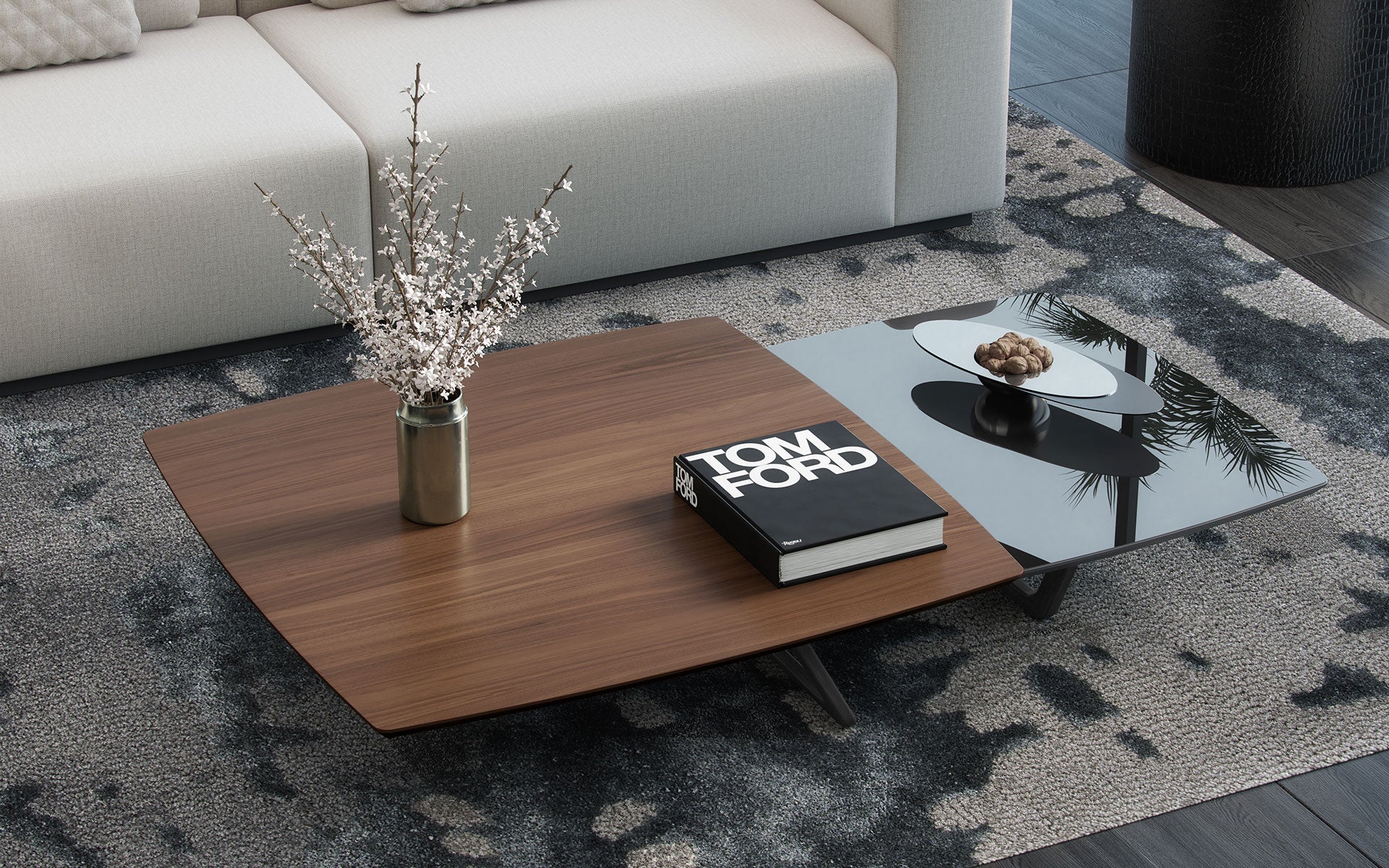 A Tom Ford book sitting on a wooden coffee table.